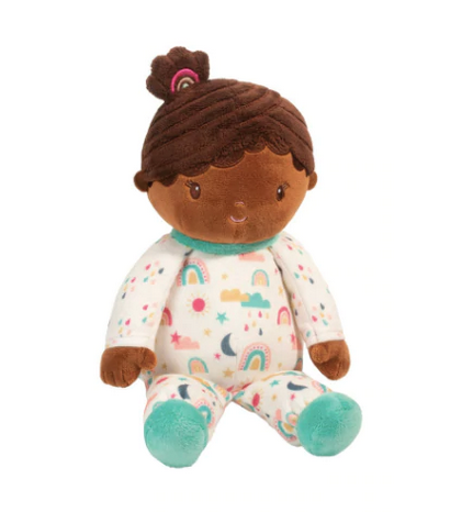 Pippa Rainbow doll is wearing a boho rainbow-inspired onesie covered in lovely hues of pink, blue jade, turquoise, and gold on a white background. Her skin tone is creamy brown, her textured hair is rich dark chocolate and her face is beautifully embroidered