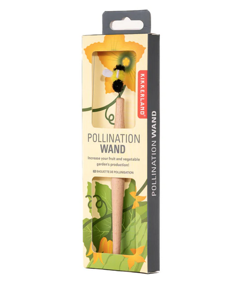 The pollination wand in a windowed cardboard box with floral illustration. 