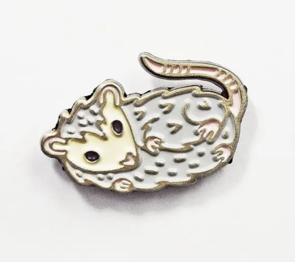 Possum Enamel Pin. This enamel pin is made of brass-tinted metal and four colors of enamel, measuring approx 1" long.