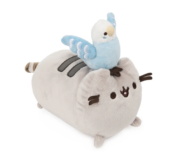 Pusheen loves her friends! In fact, some are inseparable, like her bond with Bo the parakeet. This adorable duo is having a great time together with Bo’s blue wings open and Pusheen smiling a big, wide-open grin. Bo comes attached to Pusheen.