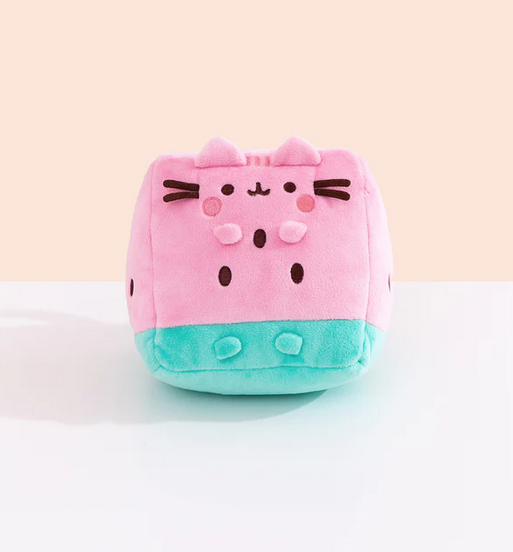 A cool slice of Pusheen watermelon plush. With a mint green rind and sweet light pink top half with Pusheens smiling face and seeds throughout.