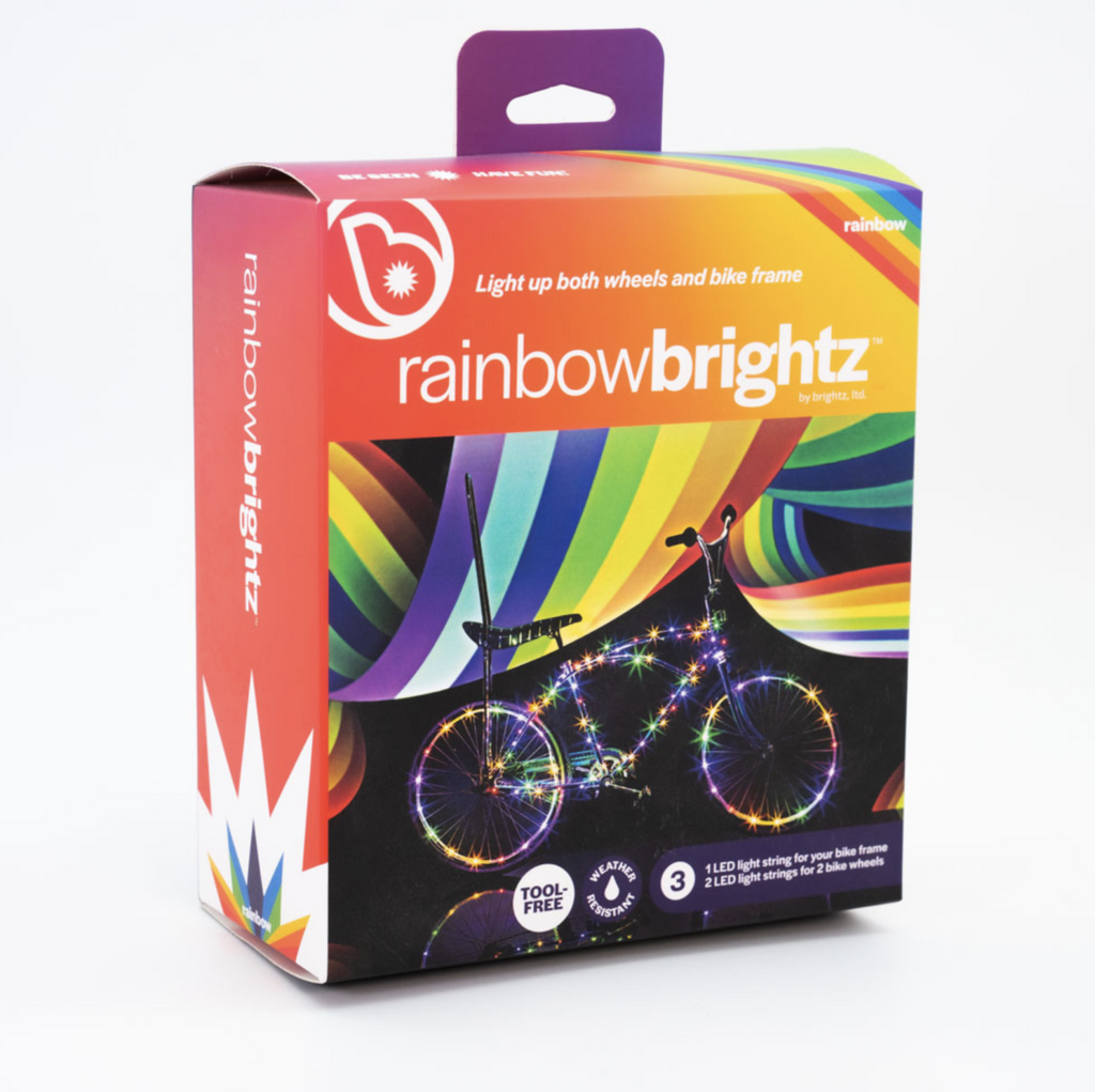 Package of Rainbow Brightz Bike Lights bundle. Shows bike with frame and wheels light up by rainbow colored lights.