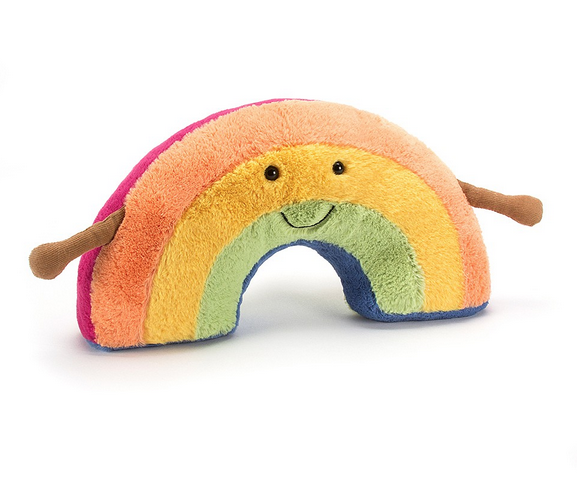 Amuseable Rainbow has  pastel stripes in peach, yellow and turquoise, cordy arms and a goofy smile.