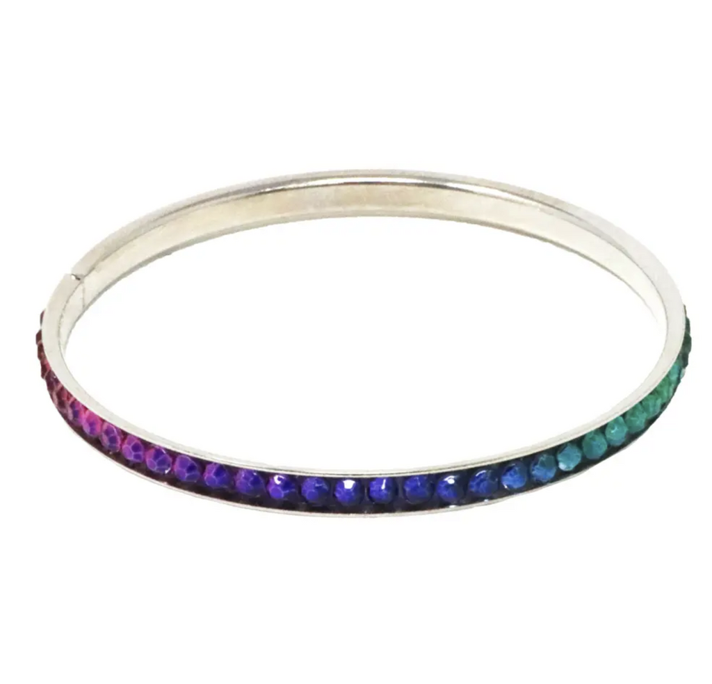 Silver bangle bracelet with rainbow scale rhinestones.