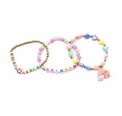 Rainbows and smiley faces adorn this set of three elastic bracelets. One bracelet has colored pastel heart beads in white, green, yellow, purple blue and pink. There is also an adorable charm of a rainbow coming out of a cloud.  Another bracelet has round pastel beads in the same colors with the word rainbow spelled out on letter beads. The last bracelet has small gold tone beads along with multicolor barrel beads with a smiley face charm in the center. 