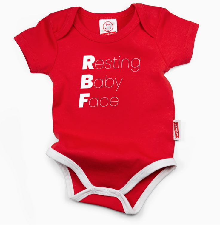 Red 3 snap baby onesie with white trim that reads Resting, Baby, Face. 