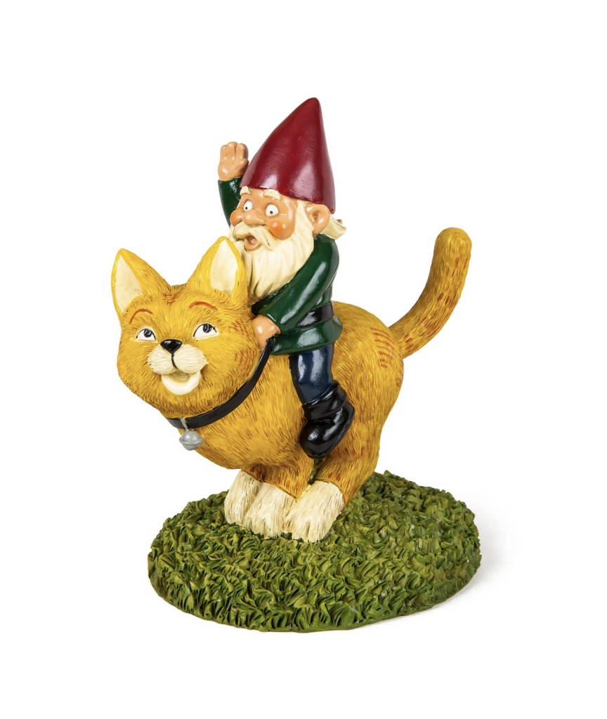 Yard gnome riding on the back of a yellow cat yard decor.