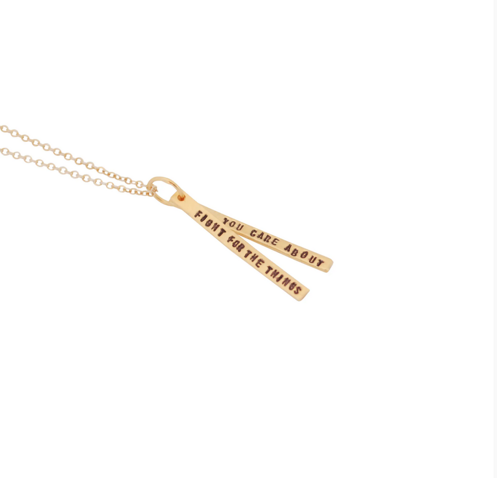 14K gold chain neckalce with two flat gold bars stamped with "Fight For The Things You Care About."