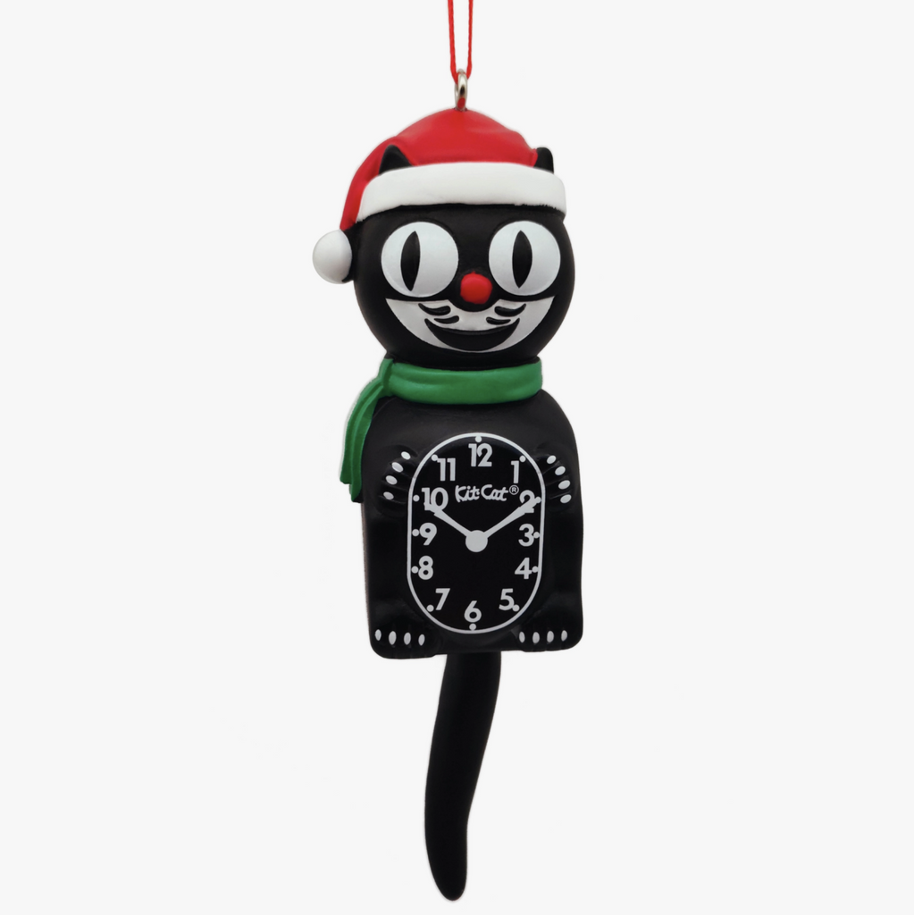 Black Kit-Cat Clock ornament wearing a red Santa hat and a green scarf.