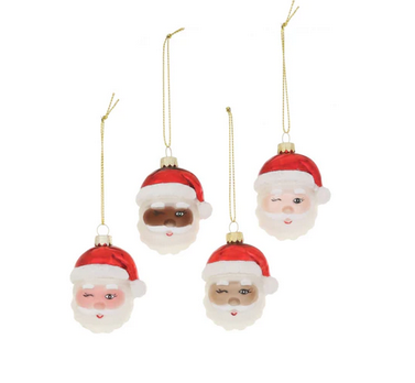 An assortment of Santa ornaments each with a different skin tone and giving his signature wink. 