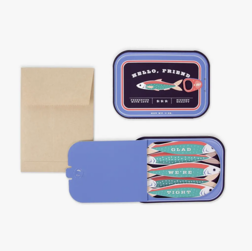 Pop up card looks like a tin of sardines with fish inside. Front reads hello friend. Pull tab to see fish inside and message that reads glas we're tight.