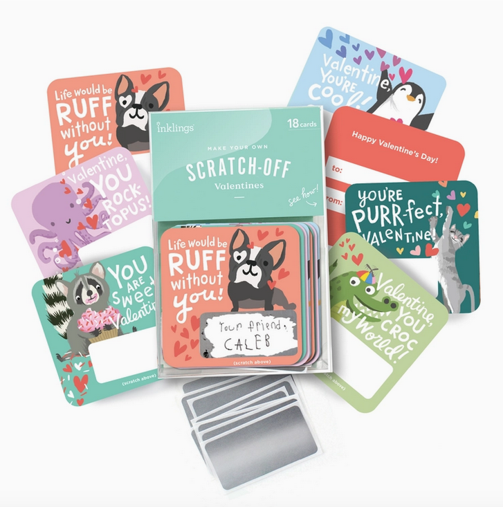 The Scratch off Valentines in the clear plastic packaging, with an example of each theme spread around it. A dog, octopus, raccoon, alligator, cat, and penguin. 