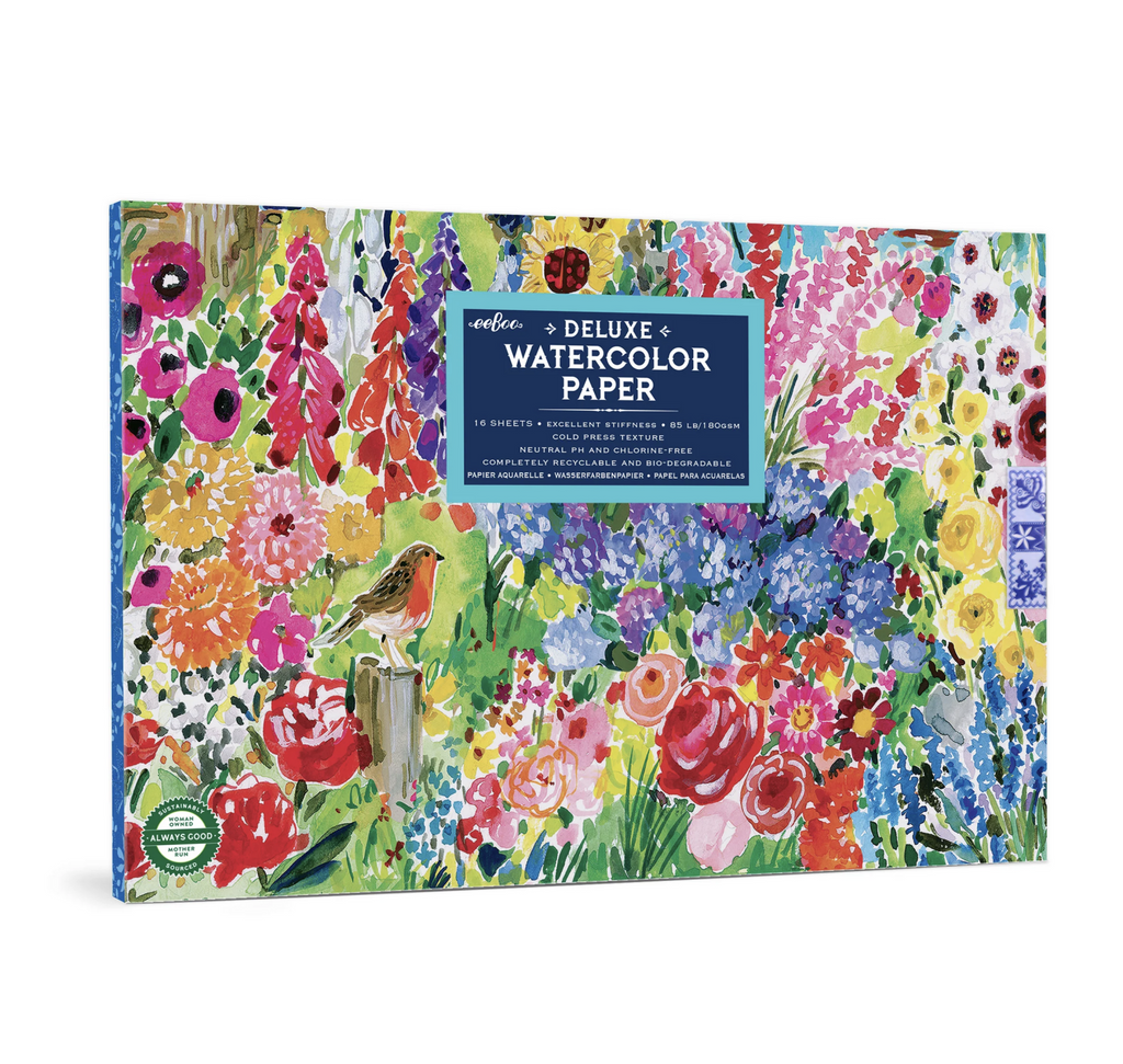 Deluxe watercolor pad with watercolored flowers and birds on the cover.