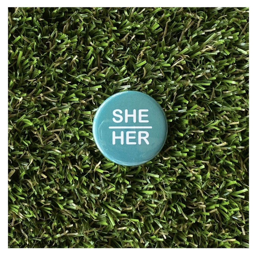 She/Her button.