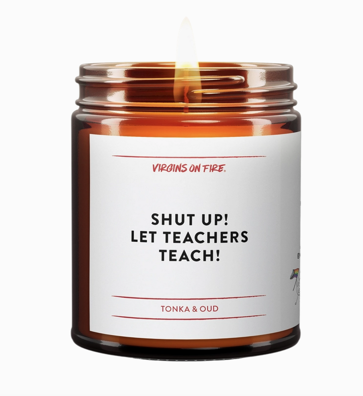 Soy wax candle in brown glass jar with wrap around white label that reads "Shut Up! Let Teachers Teach!" 