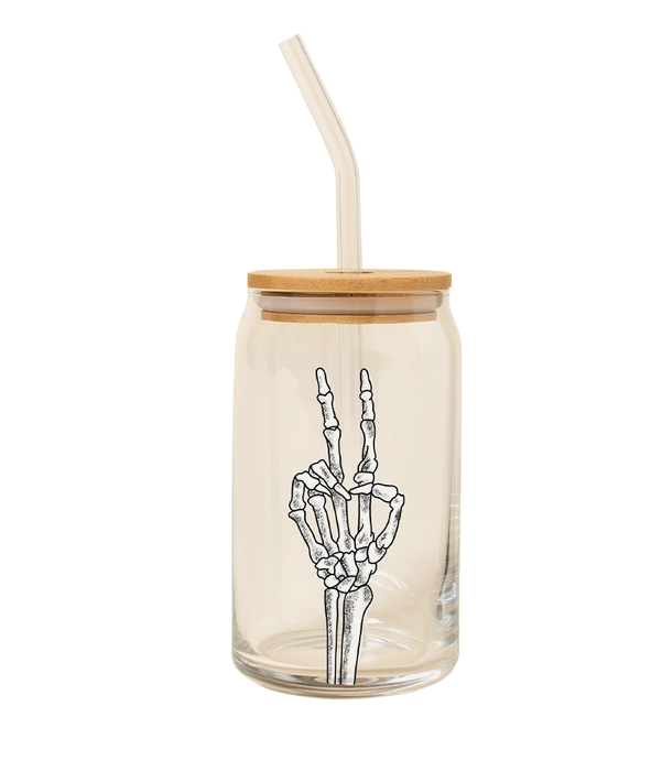 Clear Can Glass including a reusable glass straw and a rubber stopper lid with a skeleton hand throwing the peace sign decal on the front.