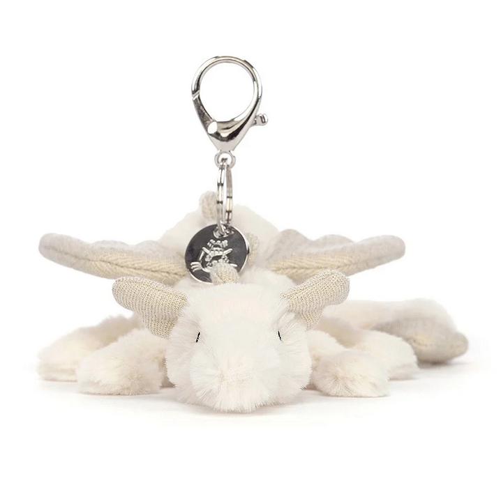 Forward facing Snow Dragon Bag Charm with the silver claw clasp and Jellycat disc in full view. 