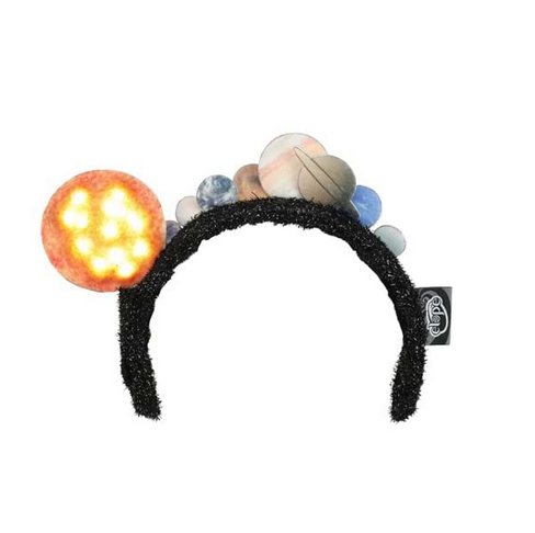 The plastic headband is covered in sparkly black polyester and is decorated with a molded felt sun as well as the eight planets. When the hidden battery pack is activated, the sun lights up!