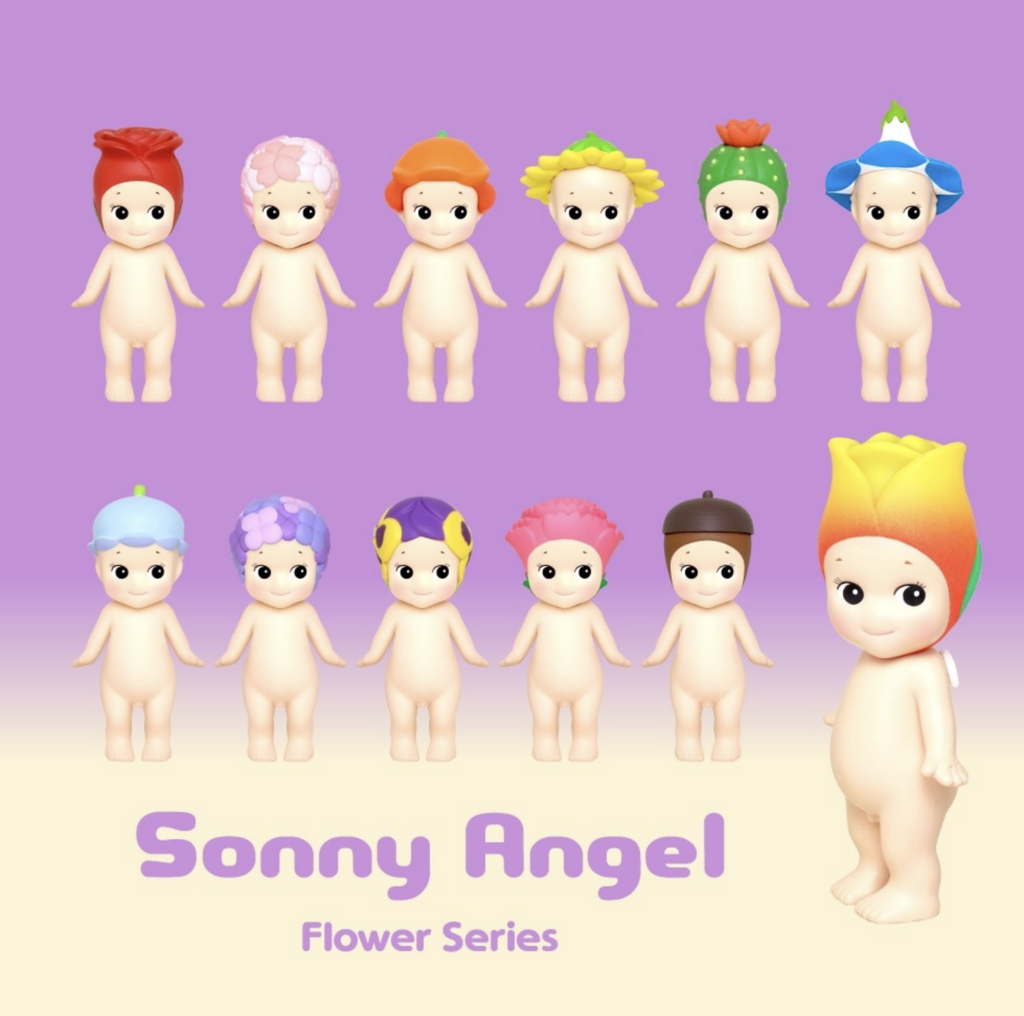 Sonny Angel Flower series. Sonny Angels are blind box collectibles soft vinyl figures of a nude kewpie style doll with different hats, like a rose, sunflower, cactus, lily, or acorn..