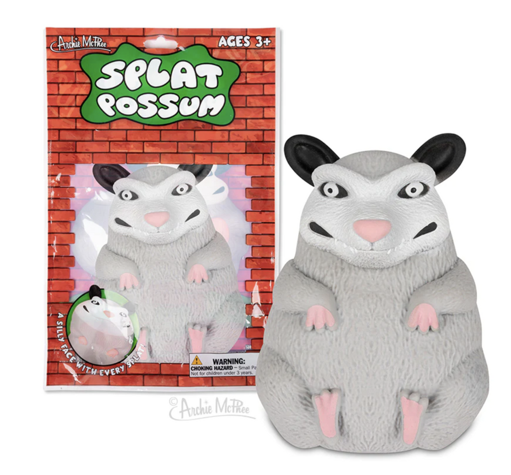  This 5-1/2" tall, soft TPR Splat Possum is filled with sand. If you throw him, he changes shape, but you can mold him back to his original possumosity.