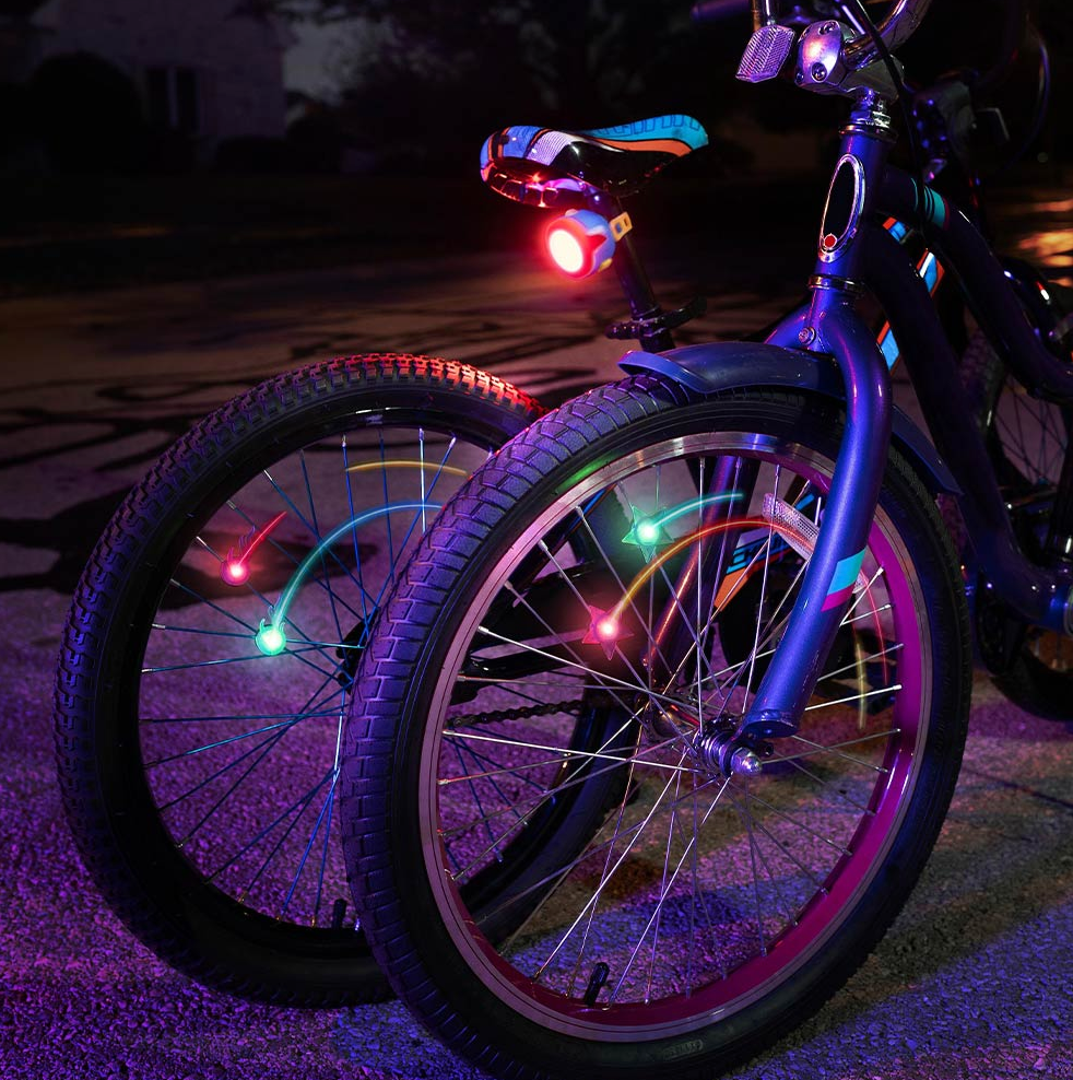 Starbrightz bike spoke lights on a bike at night.