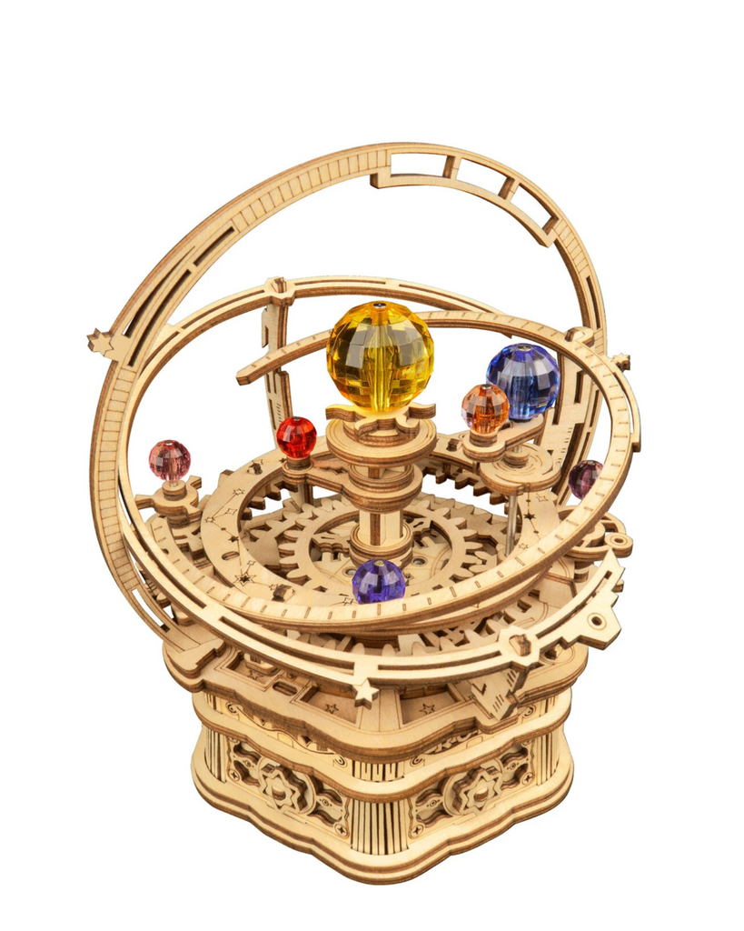 This unique music box combines the joy of assembling a puzzle with the magic of an orrery, all while the planets dance around to the song "Memory" from the hit Broadway musical, "CATS".
