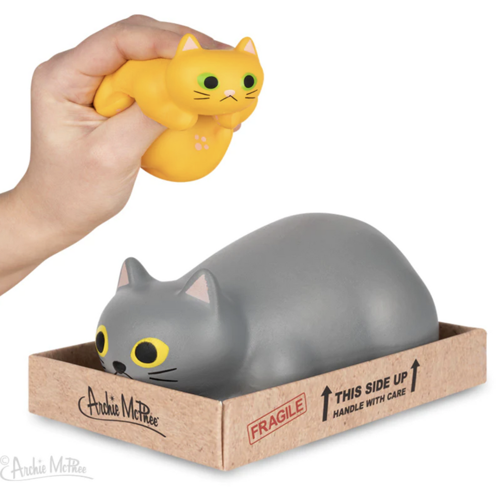 This 4-1/4" long Purrrly Kitty stress cat, made of soft polyurethane foam, has reached a state of complete relaxation after climbing into her cardboard box. You can eliminate your stress by removing her from her included reusable cardboard box, telling her what a perfect kitty she is, squeezing her and then putting her back for easy storage. Comes in two colors, sold individually.