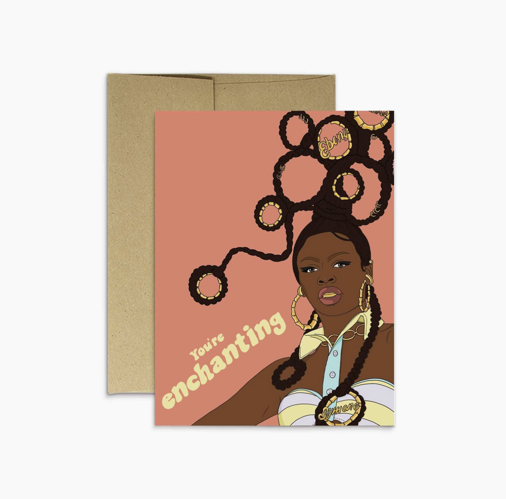 Symone from Drag Race illustration on a peach greeting card. Text reads You're enchanting.