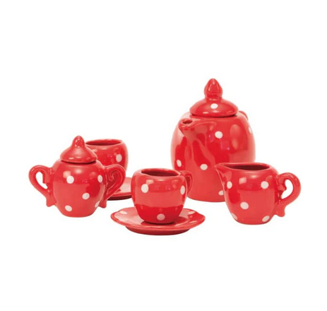 Red with white polkadots ceramci tea set. Includes Teapot and lid, 2 cups and saucers, a sugar dish and lid, and a creamer.