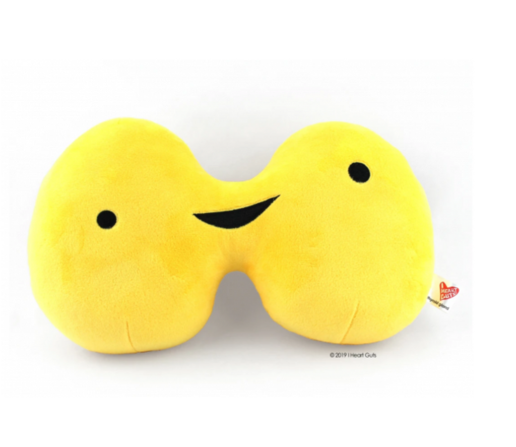 Yellow plush thyroid with a happy embroidered face.
