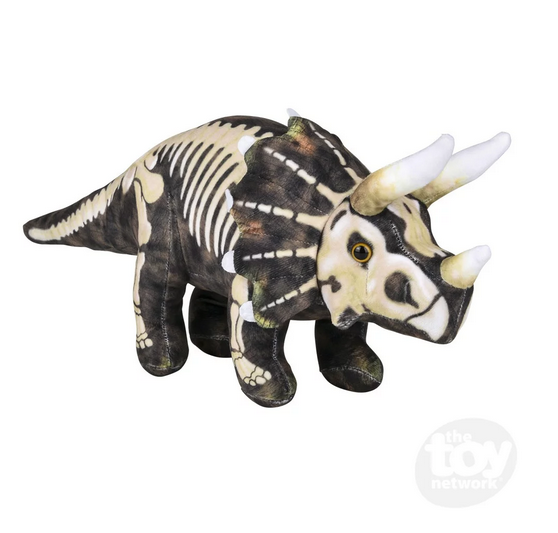 Plush Triceratops dinosaur with skeleton print over brownish red fabric. 
