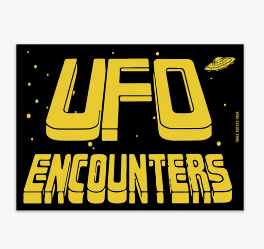 Square magnet with big yellow block letters that read "UFO Encounters" with a tiny ufo flying in the background. 