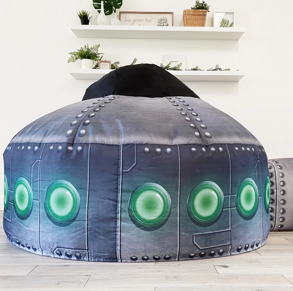 Inflated UFO Airfort indoor tent in a living room.