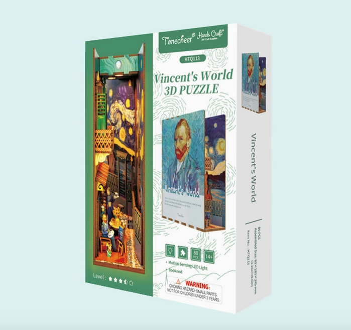 The box for Vincent's World 3D Puzzle with an image of the portrait of Van Gogh that is on the side of the puzzle as well as a picture of the completed puzzle. 
