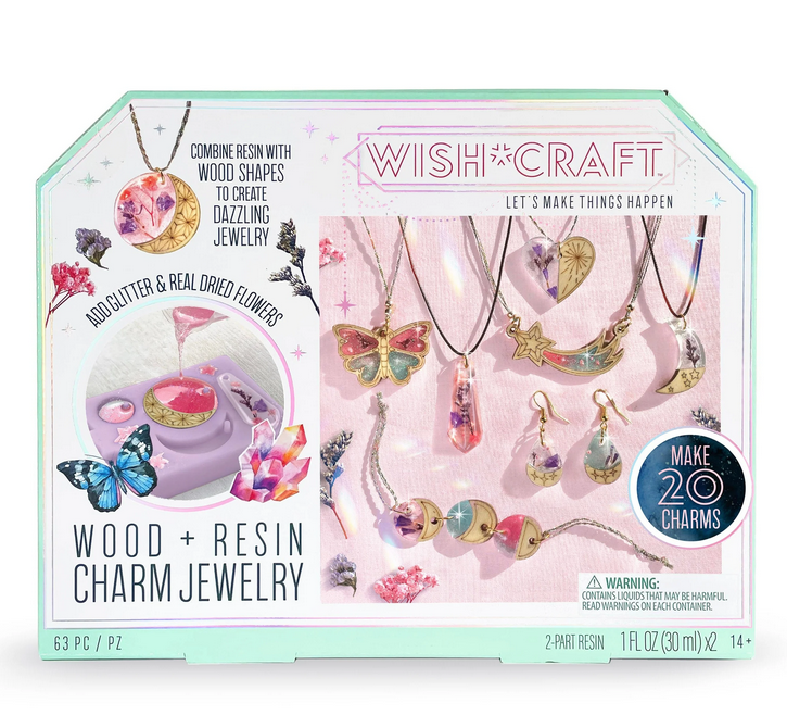 20 resin charms with real dried flowers, laser-etched wood pieces, and sparkling glitter. A silicone mold and resin are also included. The front of the box shows examples of the jewelry you can create. 